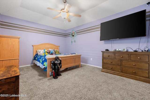 1507 Nottingham Ave, Wolfforth, TX 79382 - bedroom with carpet flooring, ceiling fan, baseboards, and vaulted ceiling