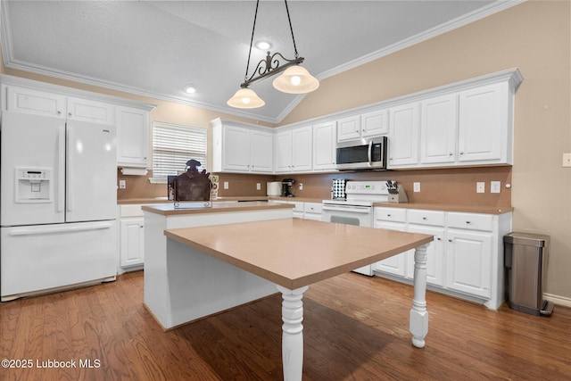 1507 Nottingham Ave, Wolfforth, TX 79382 - kitchen with white appliances, crown molding, white cabinets, lofted ceiling, and a kitchen island