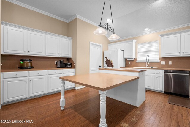1507 Nottingham Ave, Wolfforth, TX 79382 - kitchen featuring dishwasher, freestanding refrigerator, a sink, ornamental molding, and wood finished floors