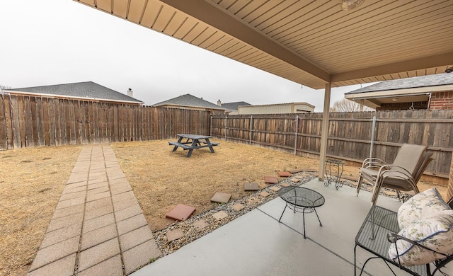 view of patio with a fenced backyard