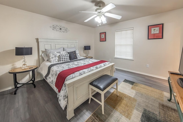 bedroom with dark wood-style flooring, ceiling fan, and baseboards