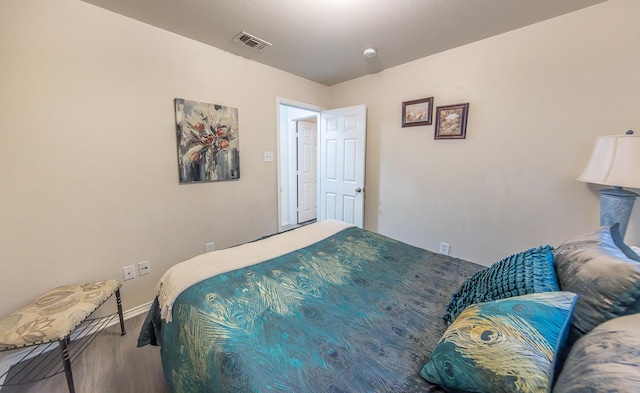 bedroom with visible vents