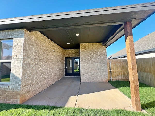 doorway to property featuring french doors and a patio area