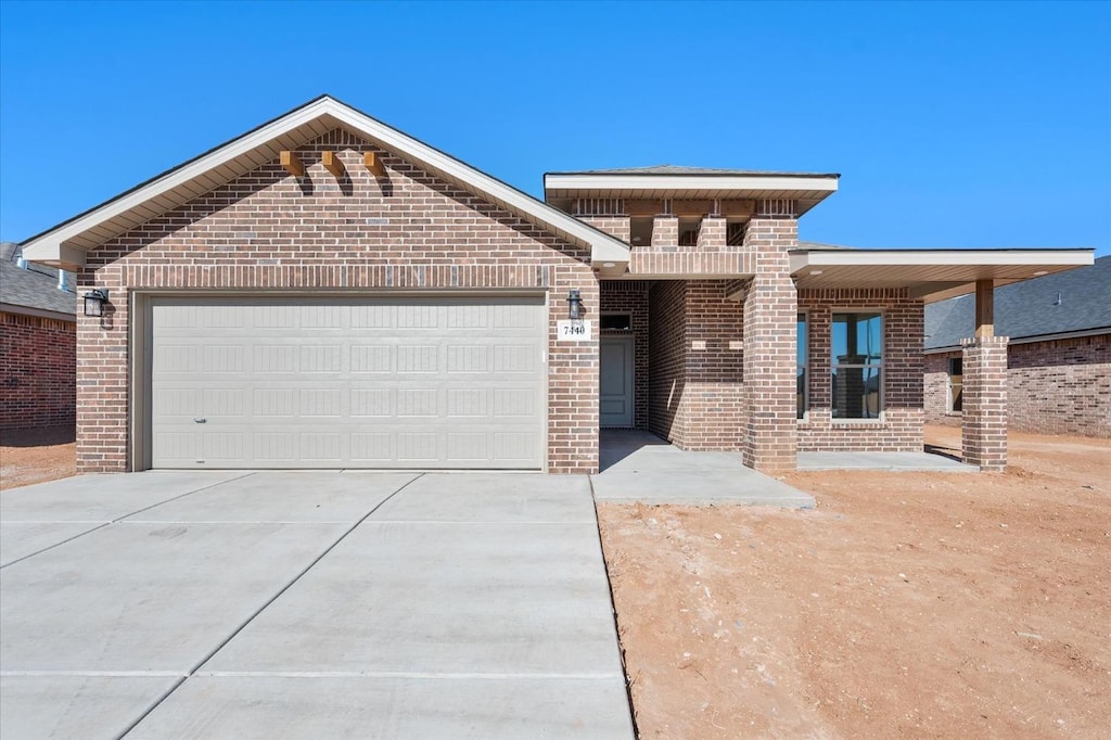 view of front of home with a garage