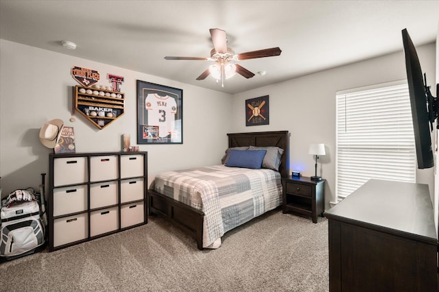 bedroom with light carpet and ceiling fan