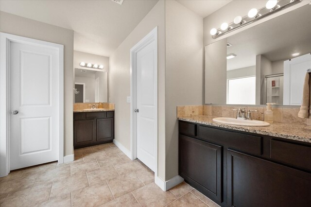 bathroom with vanity and tile patterned flooring