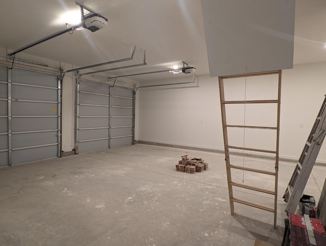 garage featuring a garage door opener