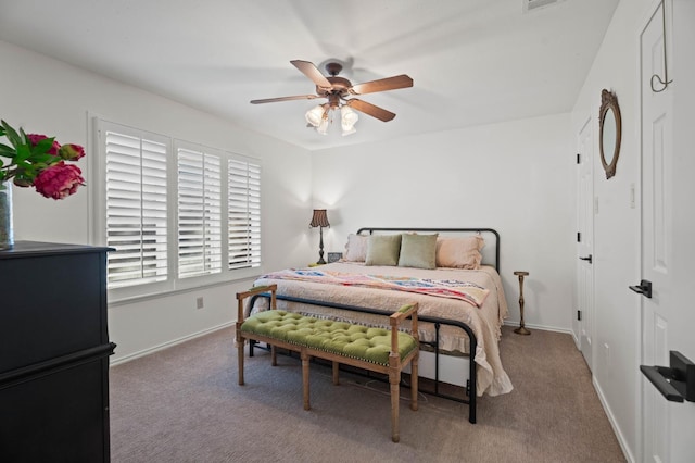 bedroom featuring ceiling fan and carpet floors