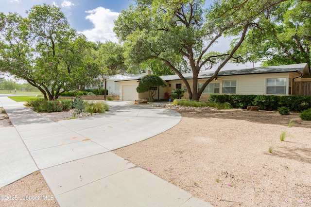 3014 25th St, Lubbock, TX 79410 - single story home with an attached garage and concrete driveway