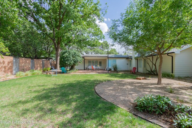 3014 25th St, Lubbock, TX 79410 - view of yard featuring a patio