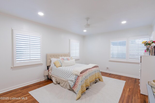 3014 25th St, Lubbock, TX 79410 - bedroom featuring wood finished floors, recessed lighting, baseboards, a ceiling fan, and crown molding