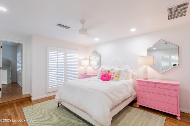 3014 25th St, Lubbock, TX 79410 - bedroom with light wood finished floors, baseboards, and recessed lighting