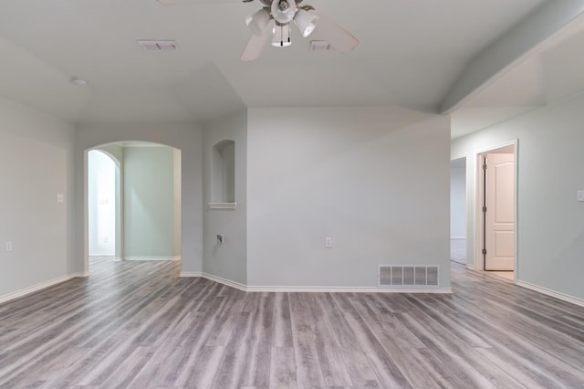 spare room with light hardwood / wood-style flooring and ceiling fan