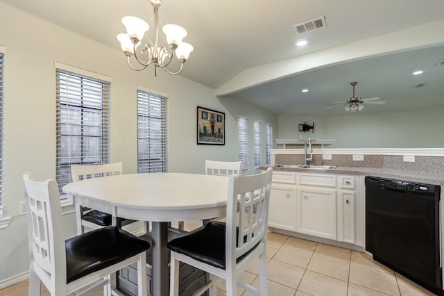 kitchen featuring sink, dishwasher, white cabinetry, light tile patterned flooring, and decorative light fixtures