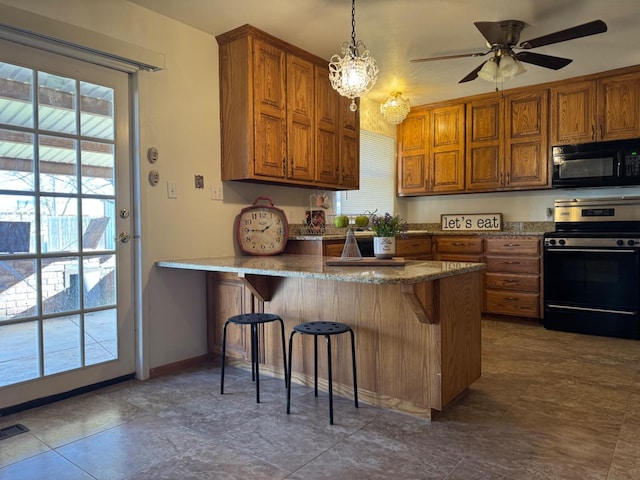 kitchen with hanging light fixtures, a breakfast bar, kitchen peninsula, and stainless steel range with electric stovetop