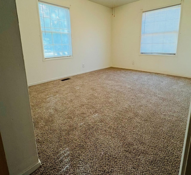 empty room featuring carpet