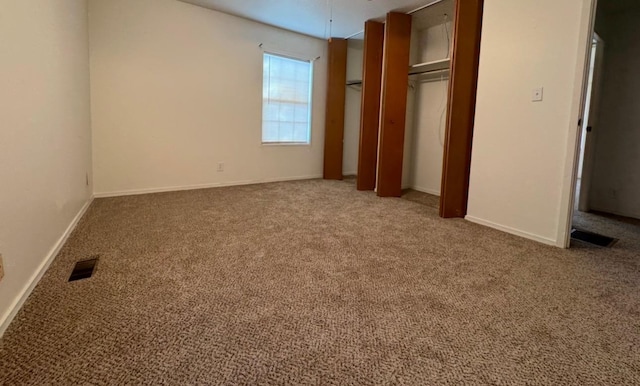 unfurnished bedroom featuring carpet