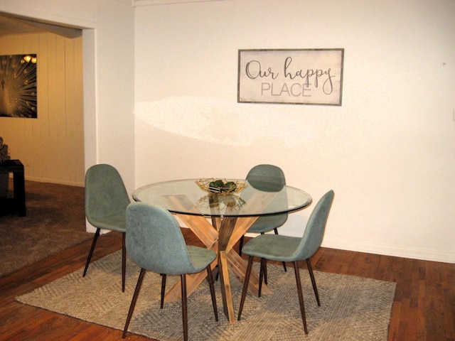 dining area with wood-type flooring