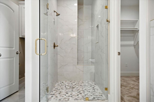 1403 Durham Ave, Wolfforth, TX 79382 - bathroom with a shower stall and a walk in closet