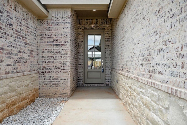 1403 Durham Ave, Wolfforth, TX 79382 - view of exterior entry featuring brick siding