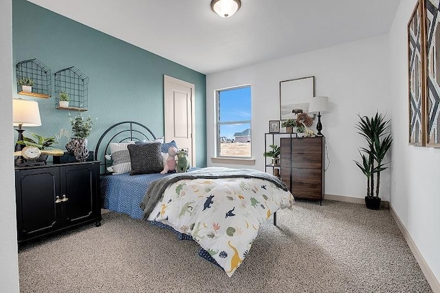 bedroom featuring carpet