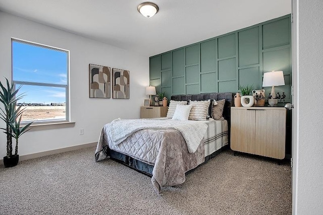 carpeted bedroom featuring radiator