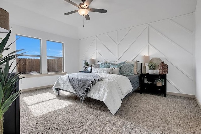 bedroom with ceiling fan and carpet flooring