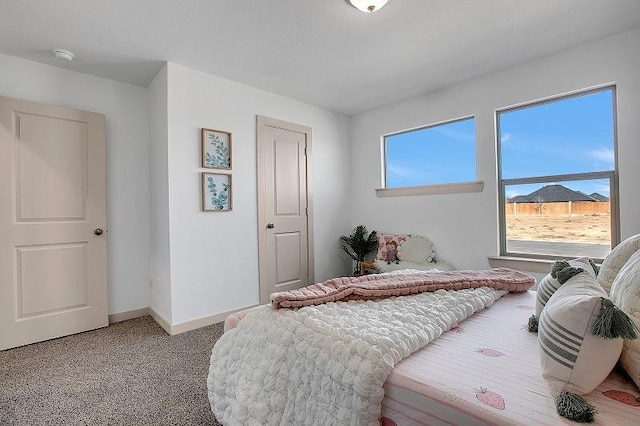 bedroom with light colored carpet