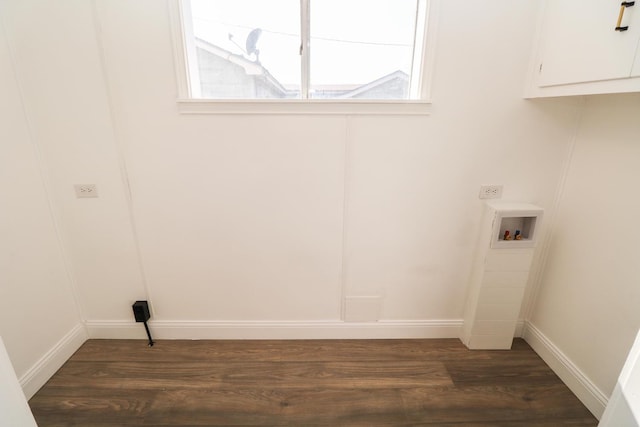 laundry room with hookup for a washing machine, electric dryer hookup, and dark hardwood / wood-style flooring