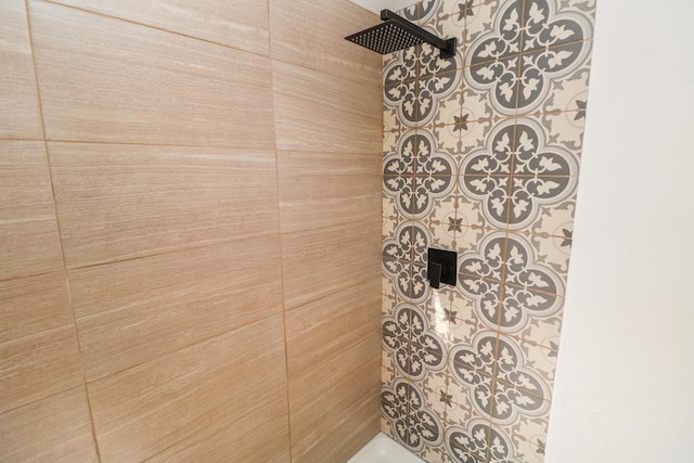 room details with a tile shower