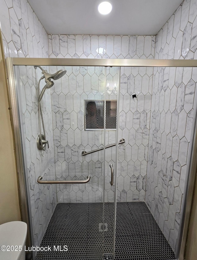 2413 25th St, Lubbock, TX 79411 - bathroom with a stall shower and toilet