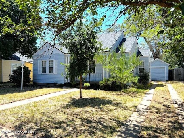 2413 25th St, Lubbock, TX 79411 - view of front of property with a front lawn, a garage, and driveway