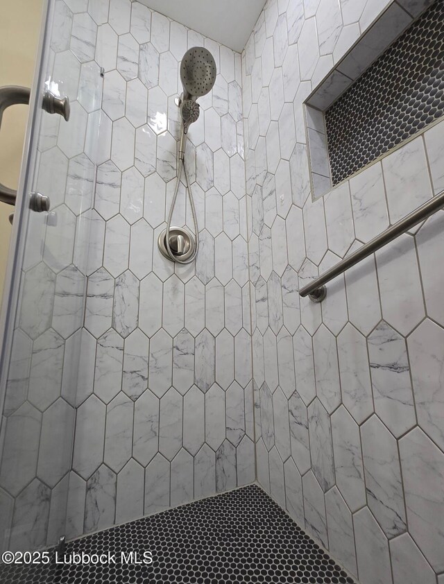2413 25th St, Lubbock, TX 79411 - full bathroom featuring a tile shower