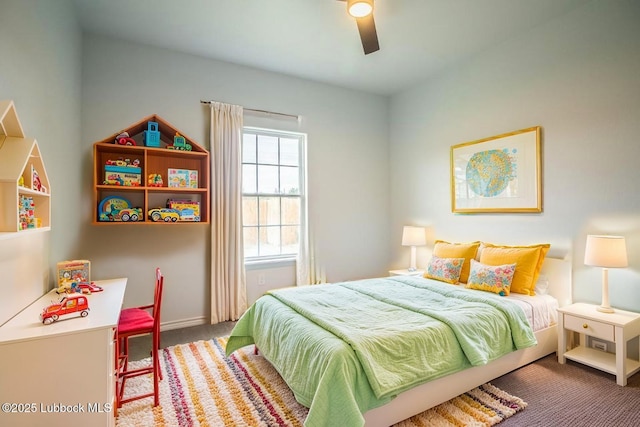 1607 Quincy Ave, Lubbock, TX 79416 - bedroom with carpet, ceiling fan, and baseboards