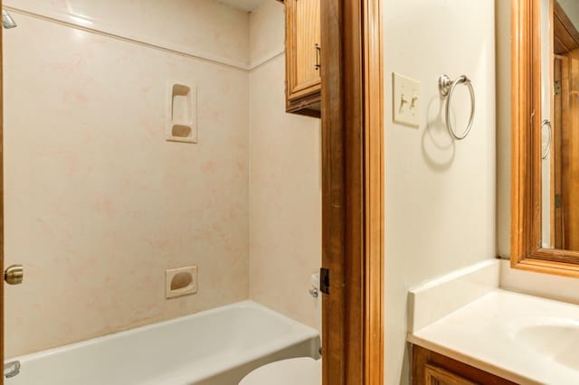 bathroom featuring toilet and vanity