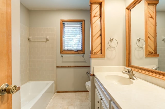 full bathroom with toilet, vanity, tile patterned flooring, and tiled shower / bath