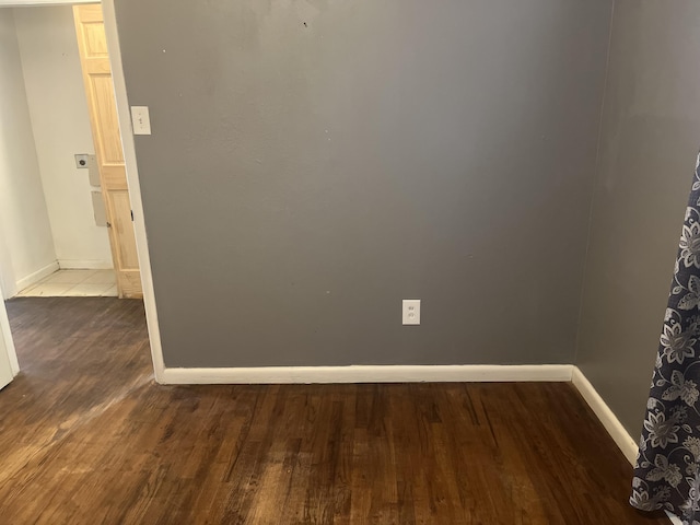 2602 45th St, Lubbock, TX 79413 - unfurnished room with baseboards and wood finished floors