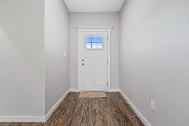 doorway featuring dark wood-type flooring