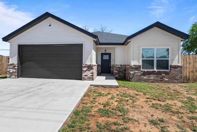 single story home with a garage