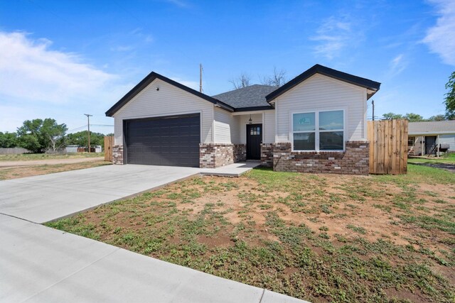 view of front of property featuring a garage