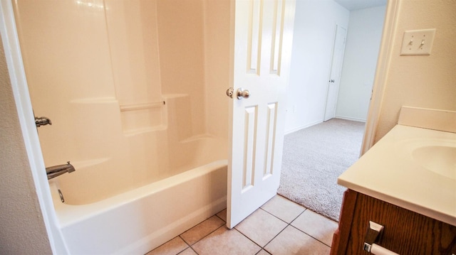 bathroom featuring vanity, tile patterned flooring, and shower / washtub combination