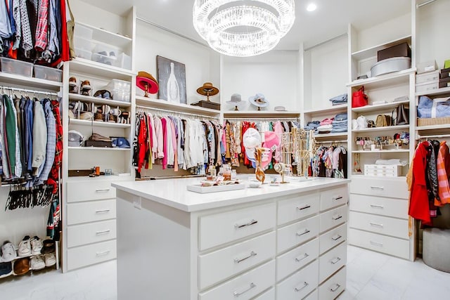 4821 119th Pl, Lubbock, TX 79424 - spacious closet featuring marble finish flooring and a chandelier