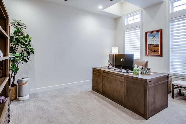 4821 119th Pl, Lubbock, TX 79424 - office area featuring ceiling fan, healthy amount of natural light, and light colored carpet