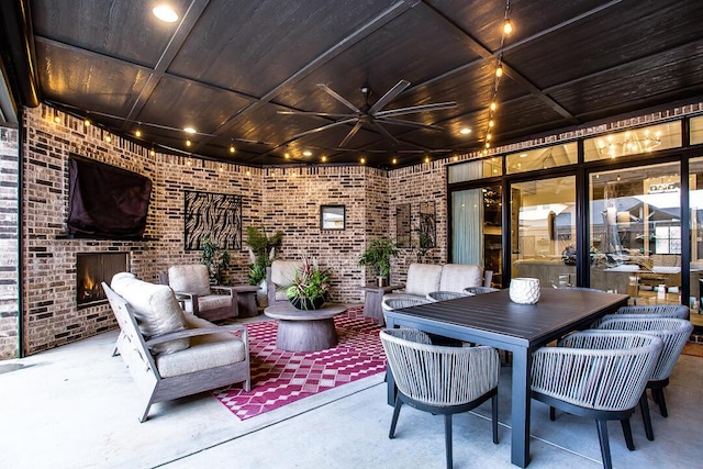 4821 119th Pl, Lubbock, TX 79424 - view of patio / terrace with a ceiling fan and an outdoor brick fireplace