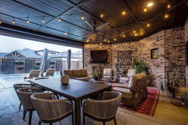 4821 119th Pl, Lubbock, TX 79424 - view of patio featuring fence, ceiling fan, an outdoor living space with a fireplace, and outdoor dining space