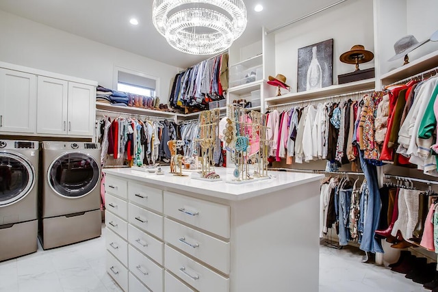 4821 119th Pl, Lubbock, TX 79424 - walk in closet featuring washer and dryer and a chandelier
