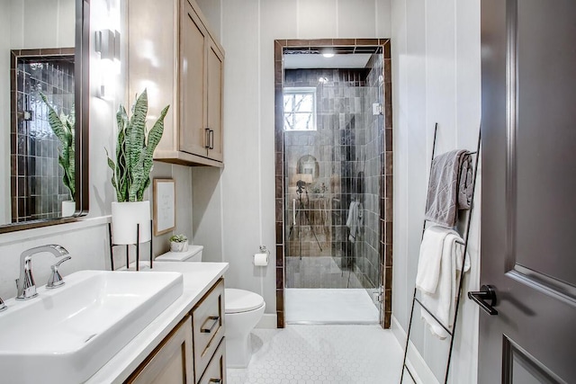 4821 119th Pl, Lubbock, TX 79424 - bathroom with a stall shower, toilet, vanity, and tile patterned floors