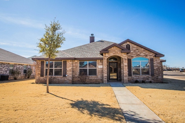 view of front of home with central AC unit