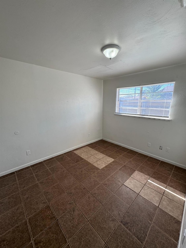 view of tiled empty room