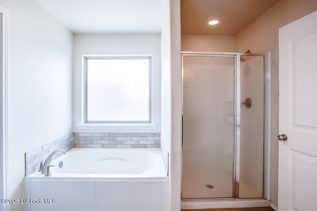 3404 Saratoga Ave, Lubbock, TX 79407 - bathroom with a stall shower and a bath